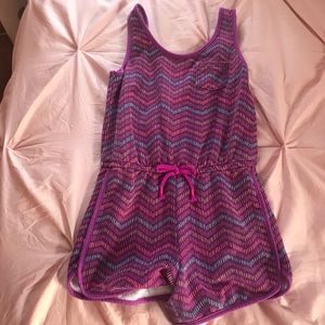 Purple and neon striped romper.